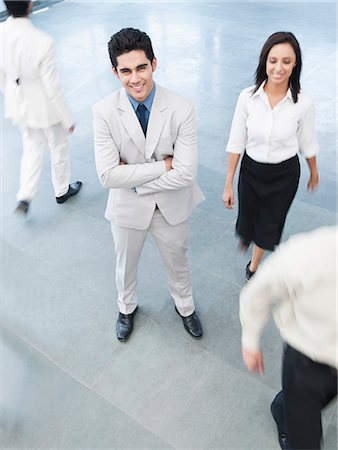 simsearch:630-06722626,k - Portrait of a businessman standing with his arms crossed Stock Photo - Premium Royalty-Free, Code: 630-06722373