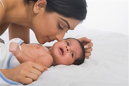 simsearch:614-07031695,k - Woman playing with her baby Stock Photo - Premium Royalty-Free, Code: 630-06722584