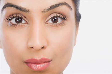 face images indian women - Close-up of a woman's face Stock Photo - Premium Royalty-Free, Code: 630-06722590