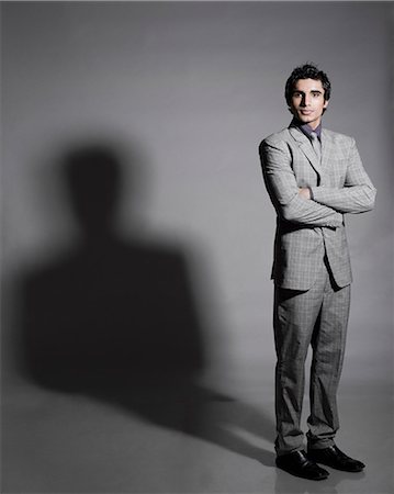 Portrait of a businessman standing with his arms crossed Photographie de stock - Premium Libres de Droits, Code: 630-06722626