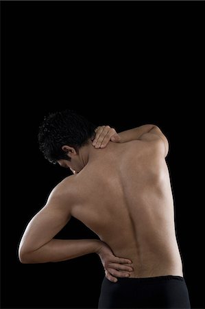 fitness and pain - Man suffering from backache Stock Photo - Premium Royalty-Free, Code: 630-06722681