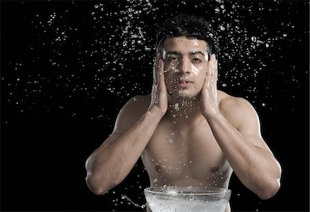 face washing - Man washing face Stock Photo - Premium Royalty-Free, Code: 630-06722696