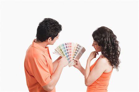 simsearch:630-06722722,k - Couple choosing color from color swatches for their house Foto de stock - Sin royalties Premium, Código: 630-06722727