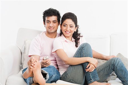 Couple watching television Stock Photo - Premium Royalty-Free, Code: 630-06722752