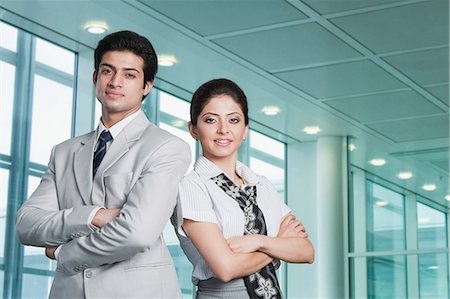 Business couple at an airport lounge Stock Photo - Premium Royalty-Free, Code: 630-06722764
