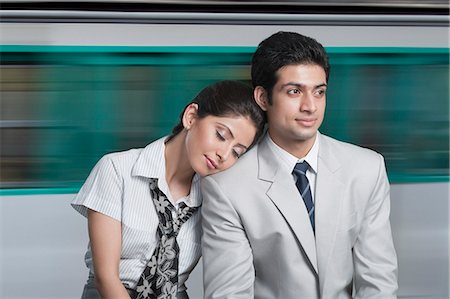 Business couple at an airport lounge Stock Photo - Premium Royalty-Free, Code: 630-06722769