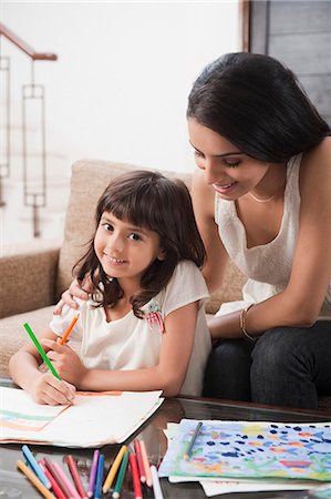 people in india home - Woman assisting her daughter in drawing Stock Photo - Premium Royalty-Free, Code: 630-06722989