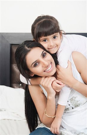 east indian mother and children - Woman playing with her daughter Stock Photo - Premium Royalty-Free, Code: 630-06723097