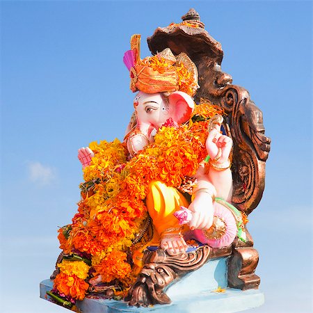 Close-up of an idol of Lord Ganesha, Mumbai, Maharashtra, India Foto de stock - Sin royalties Premium, Código: 630-06723315