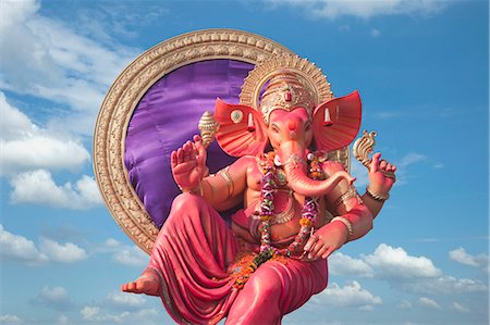 Low angle view of idol of Lord Ganesha, Mumbai, Maharashtra, India Foto de stock - Sin royalties Premium, Código: 630-06723319