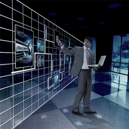 economía global - Businessman working on a virtual screen Foto de stock - Sin royalties Premium, Código: 630-06723514
