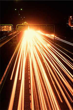 feu - Streaks of headlights of moving vehicles on the road, National Highway 8, Gurgaon, Haryana, India Photographie de stock - Premium Libres de Droits, Code: 630-06723570