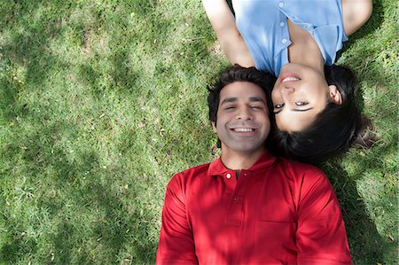 Couple lying in a park, Japanese Park, Rohini, Delhi, India Stock Photo - Premium Royalty-Free, Code: 630-07071229
