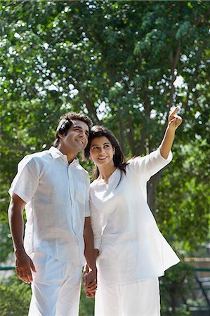 Couple enjoying in a park, Japanese Park, Rohini, Delhi, India Stock Photo - Premium Royalty-Free, Code: 630-07071223