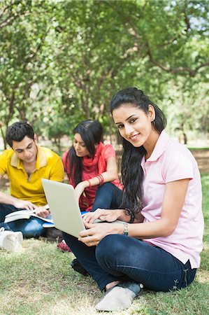 Friends studying in a park, Lodi Gardens, New Delhi, Delhi, India Stock Photo - Premium Royalty-Free, Code: 630-07071329