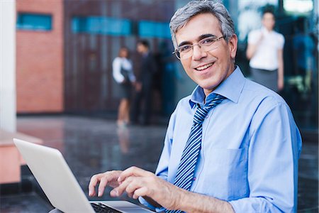 Businessman working on a laptop Stock Photo - Premium Royalty-Free, Code: 630-07071510