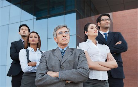 simsearch:630-06722386,k - Business people standing together with their arms crossed Stock Photo - Premium Royalty-Free, Code: 630-07071583