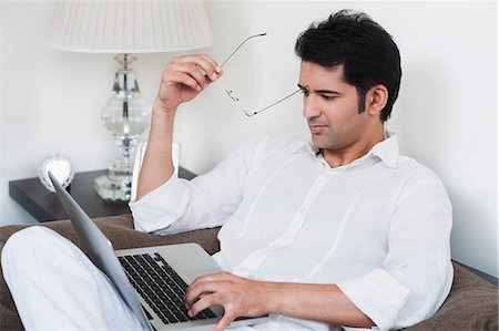 simsearch:630-07071668,k - Businessman working on a laptop Stock Photo - Premium Royalty-Free, Code: 630-07071667