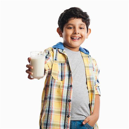 portrait boy studio smile - Boy holding a glass of milk Stock Photo - Premium Royalty-Free, Code: 630-07071770