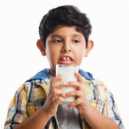 dislikes - Boy drinking milk Stock Photo - Premium Royalty-Free, Code: 630-07071772