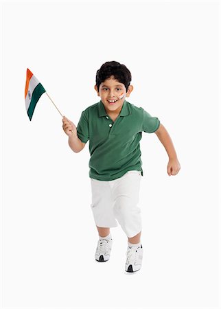 person running with white background - Boy holding an Indian flag Stock Photo - Premium Royalty-Free, Code: 630-07071814