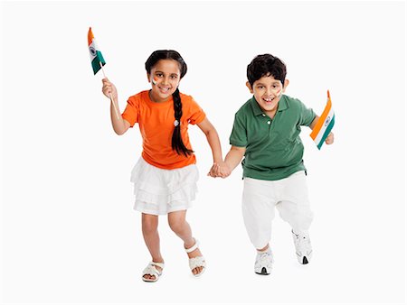 simsearch:630-07071823,k - Children holding Indian flags Fotografie stock - Premium Royalty-Free, Codice: 630-07071819