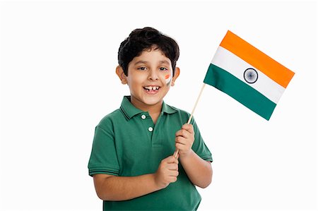 Boy holding an Indian flag Foto de stock - Sin royalties Premium, Código: 630-07071812