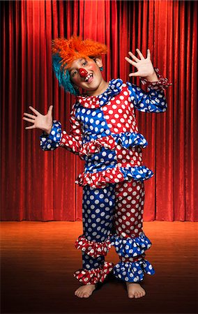 people and theater stage - Boy imitating like a clown Stock Photo - Premium Royalty-Free, Code: 630-07071824