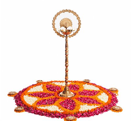 flower background white - Oil lamps and rangoli of flowers at Onam Stock Photo - Premium Royalty-Free, Code: 630-07071863