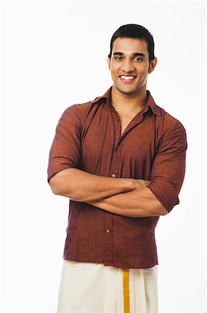 South Indian man standing with his arms crossed Stock Photo - Premium Royalty-Free, Code: 630-07071901