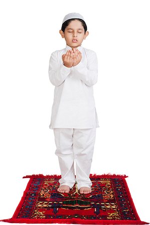 Muslim boy praying Photographie de stock - Premium Libres de Droits, Code: 630-07071921