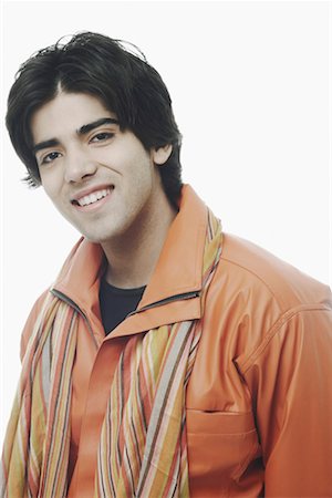 Portrait of a young man smiling Foto de stock - Sin royalties Premium, Código: 630-01075420