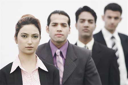 simsearch:630-01076251,k - Business executives standing in a row Stock Photo - Premium Royalty-Free, Code: 630-01076062