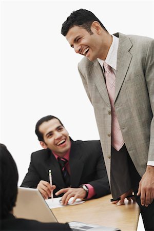 simsearch:630-01076238,k - Two businessmen laughing in a conference room Stock Photo - Premium Royalty-Free, Code: 630-01076229