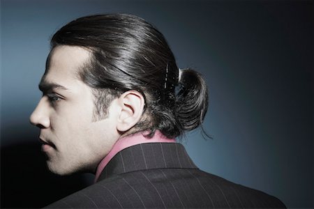 ponytail closeup back - Rear view of a businessman looking sideways Stock Photo - Premium Royalty-Free, Code: 630-01076350