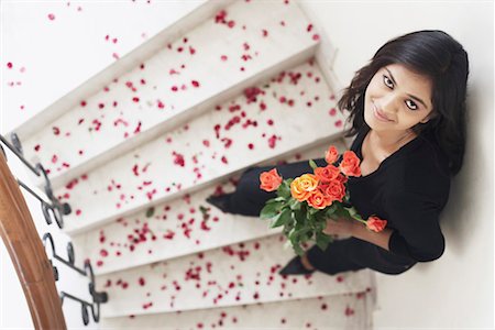 simsearch:630-01130027,k - High angle view of a young woman holding a bouquet of flowers Stock Photo - Premium Royalty-Free, Code: 630-01076511