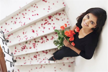 simsearch:630-01130027,k - High angle view of a young woman holding a bouquet of flowers Stock Photo - Premium Royalty-Free, Code: 630-01076512