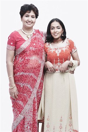 simsearch:700-00796629,k - Portrait of a mother standing with her daughter Stock Photo - Premium Royalty-Free, Code: 630-01076960