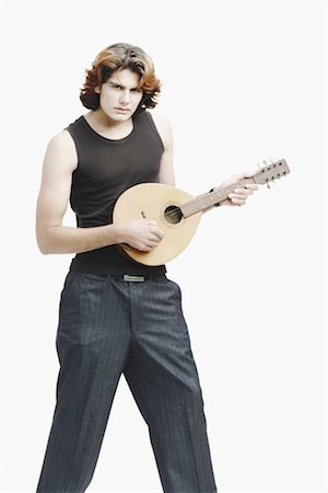 Portrait d'un musicien mâle jouant du banjo Photographie de stock - Premium Libres de Droits, Code: 630-01077136