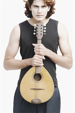 Portrait d'un musicien mâle jouant du banjo Photographie de stock - Premium Libres de Droits, Code: 630-01077140
