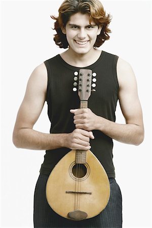Portrait d'un musicien homme détenant un banjo Photographie de stock - Premium Libres de Droits, Code: 630-01077141