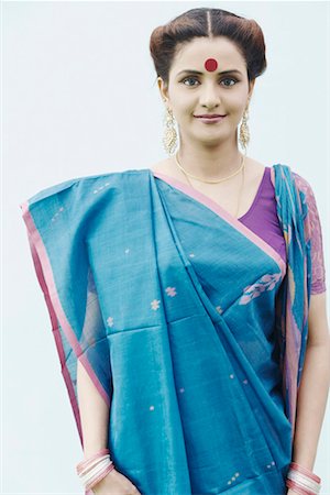 Portrait of a young woman wearing a sari Stock Photo - Premium Royalty-Free, Code: 630-01077179