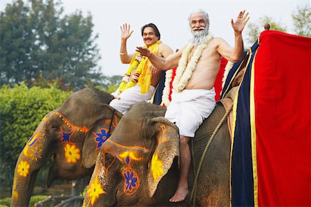 simsearch:841-06344585,k - Portrait of two priests riding elephants Stock Photo - Premium Royalty-Free, Code: 630-01077309