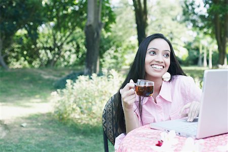 Teenage girl holding a cup of tea Stock Photo - Premium Royalty-Free, Code: 630-01079040