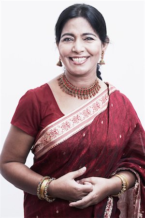 saree style - Portrait of a mature woman smiling Stock Photo - Premium Royalty-Free, Code: 630-01079222