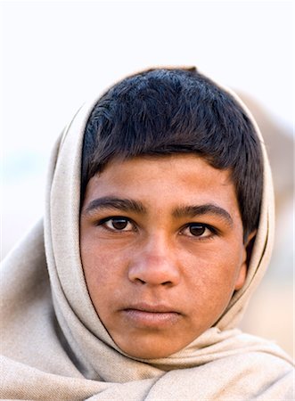 simsearch:640-01365454,k - Portrait of a teenage boy wearing a shawl, Pushkar, Rajasthan, India Stock Photo - Premium Royalty-Free, Code: 630-01080496