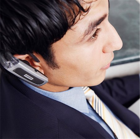 simsearch:630-01191682,k - Close-up of a businessman using a laptop Stock Photo - Premium Royalty-Free, Code: 630-01126839