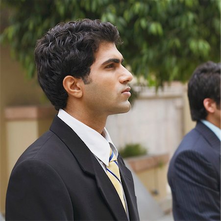 simsearch:630-01126991,k - Side profile of a businessman looking serious Stock Photo - Premium Royalty-Free, Code: 630-01126832