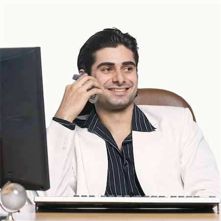 simsearch:630-01078367,k - Close-up of a businessman talking on a cordless phone Foto de stock - Sin royalties Premium, Código: 630-01126981