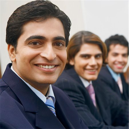 simsearch:630-01128784,k - Portrait of three businessmen smiling Stock Photo - Premium Royalty-Free, Code: 630-01126996